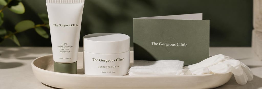 Photorealistic close-up of an aftercare kit on a cream ceramic tray: SPF tube, gentle cleanser jar, folded aftercare card (no readable text), gauze and gloves, soft forest green background, premium clinical still life.