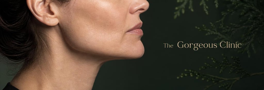Photorealistic close-up of a jawline profile showing gentle tension at the angle of the mandible, mature skin texture, soft clinical lighting, subtle forest green background detail, editorial medical feel